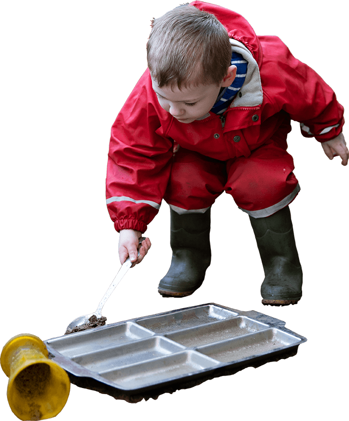 Child Playing in Mud