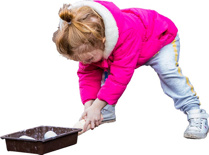 Little Girl Playing With Stones
